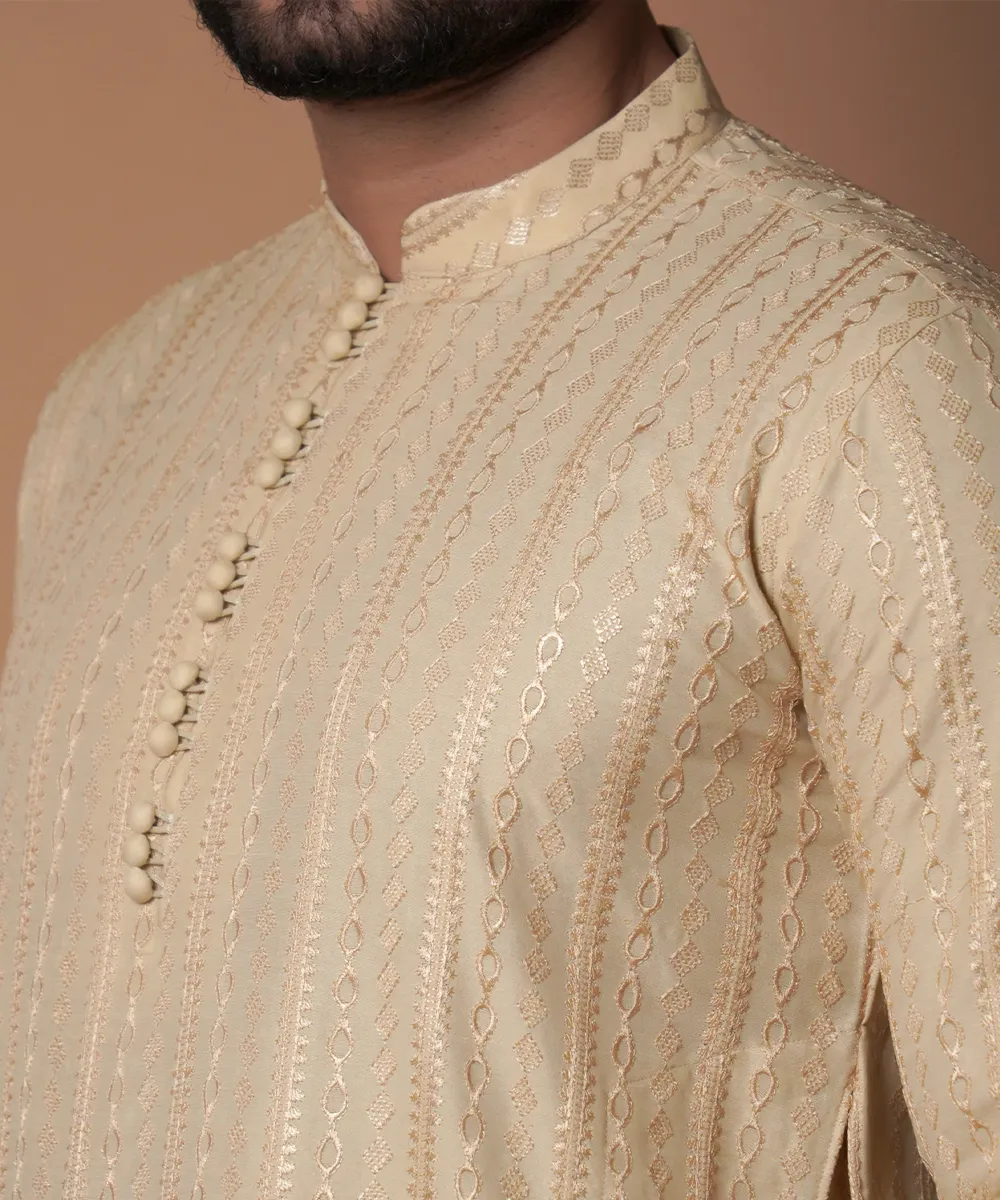 Beige symmetrical Embroidered Kurta & Pyjama Set